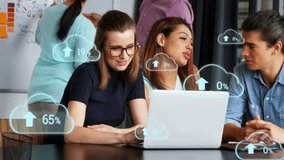 Animation of clouds, 0-100 increasing numbers, arrows, percentage, coworker discussing over laptop. Digital composite, multiple exposure, cloud computing, diverse, team, office, growth, technology. - Powered by Shutterstock - Get 15% off with code: PIKWIZARD15