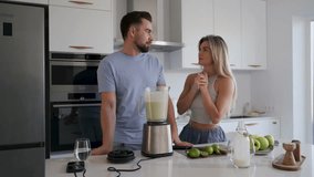  Couple Preparing Healthy Smoothie Together in Bright Modern Kitchen - Powered by Shutterstock - Get 15% off with code: PIKWIZARD15