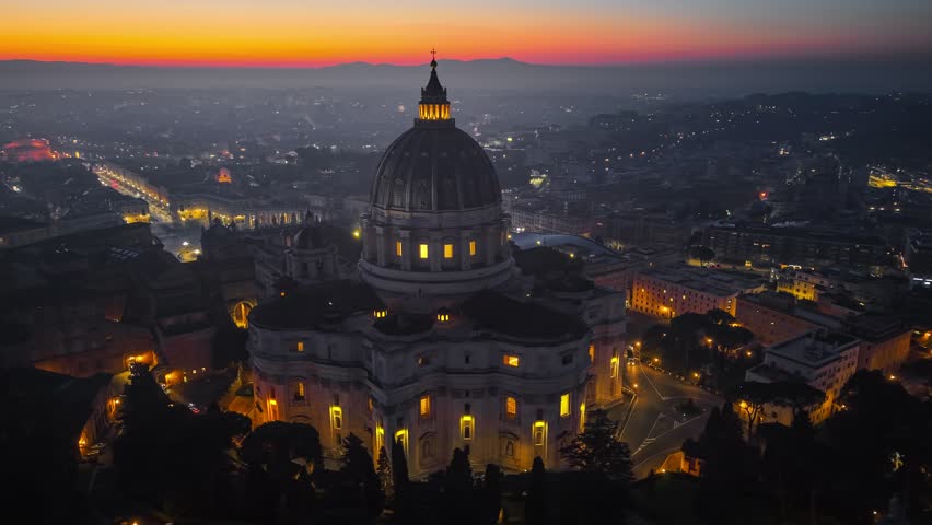 Aerial View of Vatican City, St. Peter Basilica and St. Peter Square in Rome, world famous religious center, Renaissance architecture and European cultural heritage at sunrise