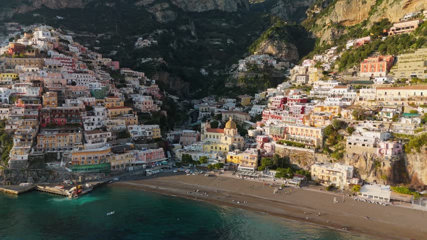 Positano on the Amalfi Coast in southern Italy, colorful cliffside houses above the Tyrrhenian Sea creating iconic Mediterranean travel destination. Aerial View reveals dramatic coastal landscape