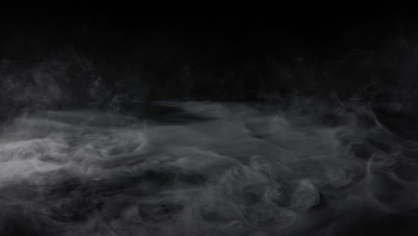 Super Slow Motion Shot of Mist Floating Over The Surface Isolated on Black Background at 1000fps.