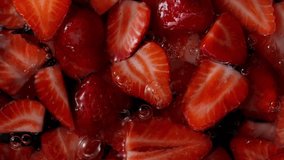 Super Slow Motion Shot of Fresh Strawberries Falling into Water at 1000fps. - Powered by Shutterstock - Get 15% off with code: PIKWIZARD15