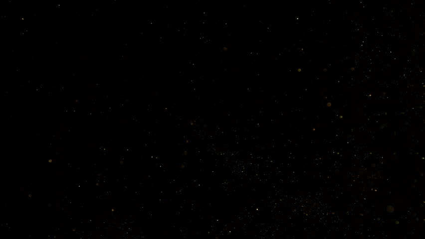 Super Slow Motion Shot of Golden Glitters on Black Background at 1000fps.