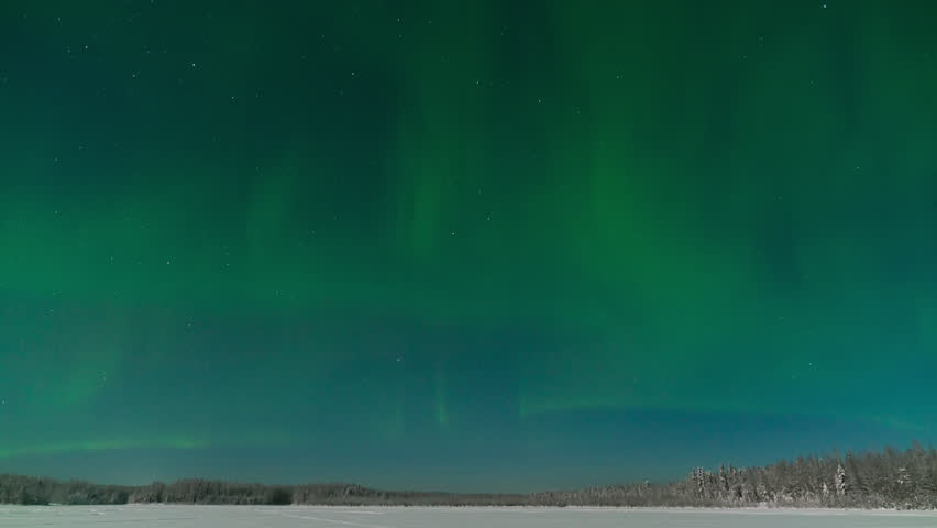Timelapse of Aurora Borealis Northern Lights over winter landscape in Fairbanks, Alaska
