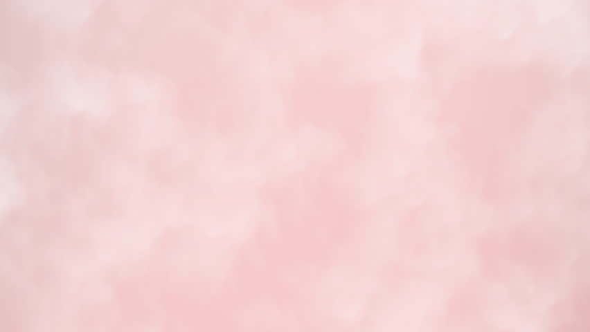 A soft and ethereal abstract animated background featuring billowing pink clouds or smoke.