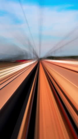 High-speed train ride timelapse from driver perspective, seamless loop.