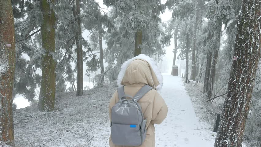 Breathtaking 4K UHD drone and time-lapse footage of stunning winter snowscapes and snow-capped mountains, showcasing a magical winter wonderland with snow-covered peaks, frozen lakes, and frost-kissed forests. Capturing soft powdery snow, golden hour light on snow-capped ridges, and ethereal snow mist, the video highlights the pristine beauty of nature in winter. Perfect for Shutterstock users—ideal for winter travel promotions, ski resort campaigns, nature documentaries, and commercial design projects seeking authentic.