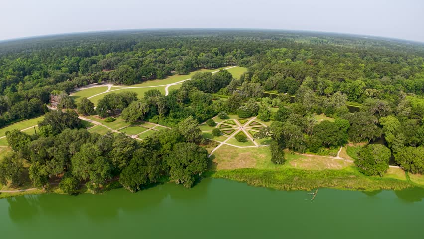 Drone footage shows a star-shaped garden design with intersecting grassy paths and surrounding lawns at Middleton Place Plantation near Charleston, South Carolina