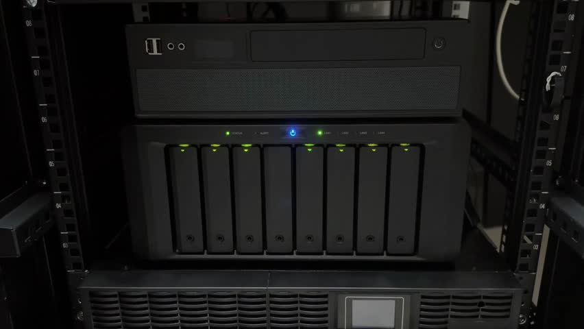 Detailed View of a Network Storage Rack System Featuring Multiple Drives and Active Indicators