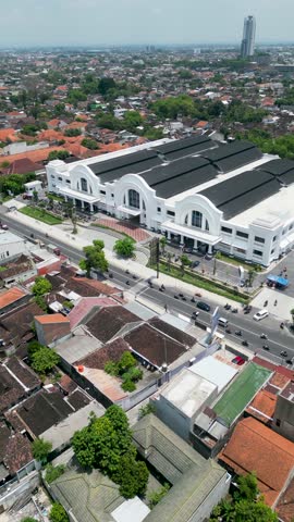 Pasar Jongke in Solo is a bustling traditional market building, with a lively facade and busy surroundings, reflecting the vibrant urban culture and daily life of the city.