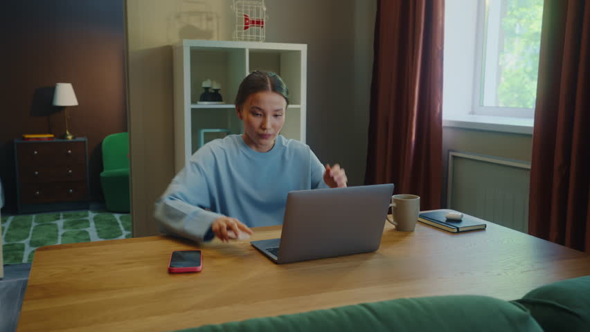 Angry asian woman work laptop home. Girl fail task. Female employee failure. Busy person use broken pc. Online computer freelance distant remote job. Worker ruined career, loss start up money. Bad day