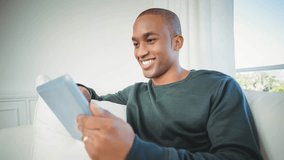 Data processing over world map against african american man using digital tablet. Global networking and technology concept - Powered by Shutterstock - Get 15% off with code: PIKWIZARD15