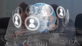 Animation of globe, network of connections with icons over business people. Global connections, business, finance and data processing concept digitally generated video. - Powered by Shutterstock - Get 15% off with code: PIKWIZARD15