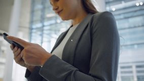 Animation of network of connections with icons over caucasian women using smartphone. global connections, data processing and digital interface concept digitally generated video. - Powered by Shutterstock - Get 15% off with code: PIKWIZARD15