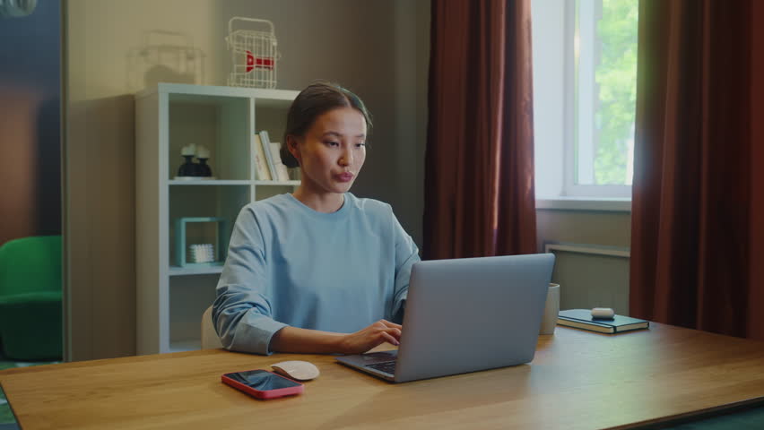 Confident happy asian woman worker work laptop home. Successful girl look at camera smile. Female employee portrait. Busy ceo person use pc. Online education student. Computer freelancer. Distant job.