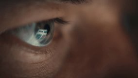 Close-up of an eye reflecting a digital screen, symbolizing technology, cybersecurity, digital focus, or futuristic concepts. - Powered by Shutterstock - Get 15% off with code: PIKWIZARD15