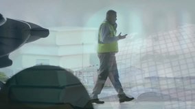 Animation of globe and financial data processing over male engineer using smartphone. Global business, finance, computing and data processing concept digitally generated video. - Powered by Shutterstock - Get 15% off with code: PIKWIZARD15