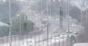 As vehicles moving along wet highway, clear bars and line graph fluctuating showing traffic flow. Traffic, data visualization, analytics, transportation, urban, motion, technology - Powered by Shutterstock - Get 15% off with code: PIKWIZARD15
