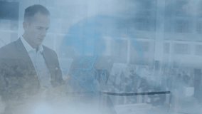 Animation of globe and cityscape over caucasian businessman using laptop. global business, data processing and technology concept digitally generated video. - Powered by Shutterstock - Get 15% off with code: PIKWIZARD15