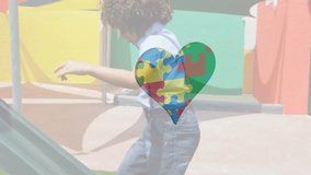 Animation of puzzle pieces with heart icon over african american schoolboy. Autism awareness month concept digitally generated video. - Powered by Shutterstock - Get 15% off with code: PIKWIZARD15