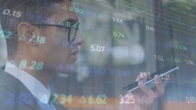 Animation of stock market data processing against businessman talking on smartphone. Global economy and business data technology concept - Powered by Shutterstock - Get 15% off with code: PIKWIZARD15