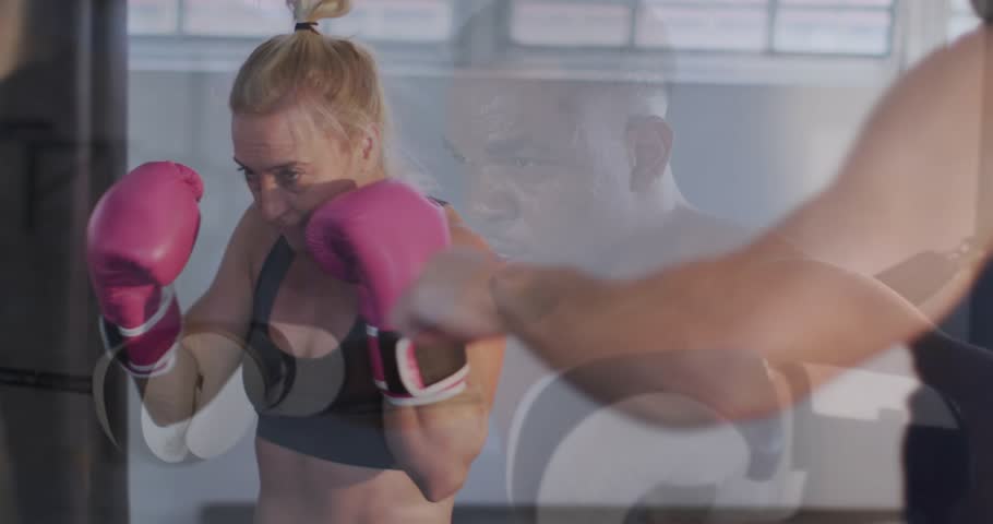 Practicing boxing moves, two people in gym with large windows and animation. fitness, training, exercise, sports, sparring, martial arts
