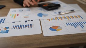 A diverse team of young professionals collaborates in a modern office, using a laptop and tablet for a creative brainstorming session. - Powered by Shutterstock - Get 15% off with code: PIKWIZARD15