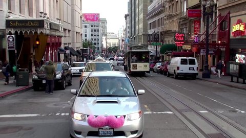 SAN FRANCISCO, - APRIL 04:
The Car with giant pink fluffy mustache at street.
April 04, 2013 in San Francisco, California, USA.