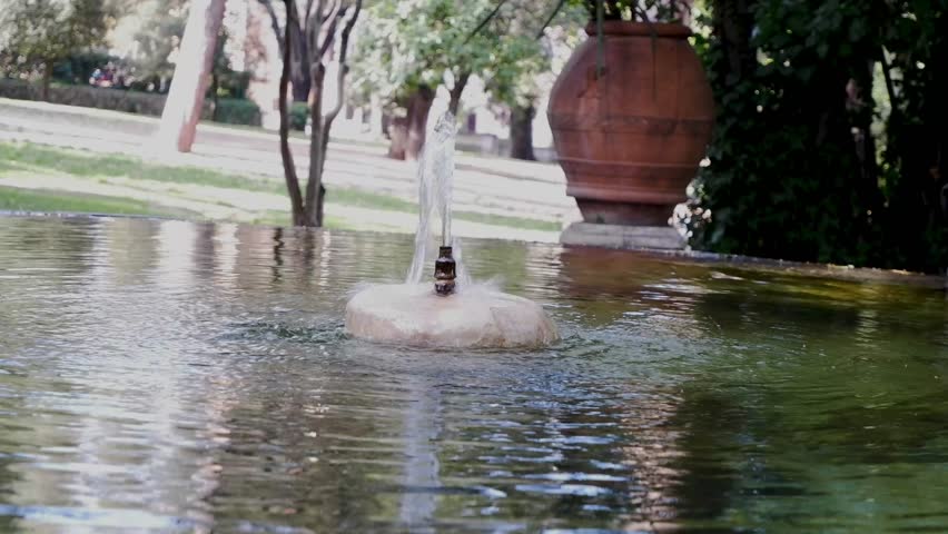 Old Small Stone Fountain in Courtyard