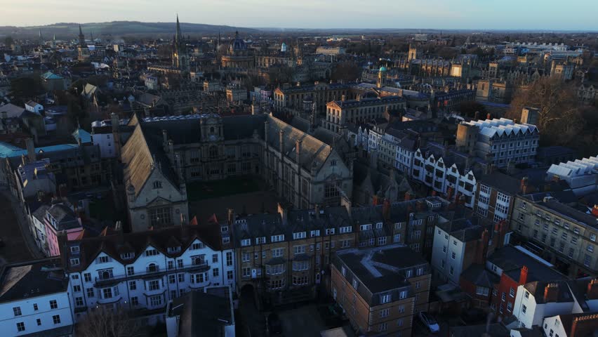 Oxford city aerial view featuring ancient university buildings and surrounding rooftops