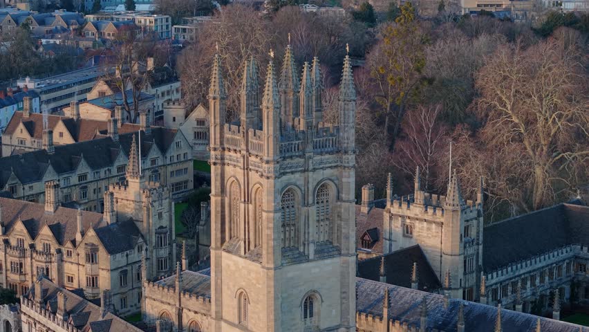 Magdalen College tower stands tall, representing education, history, and learning in Oxford, United Kingdom