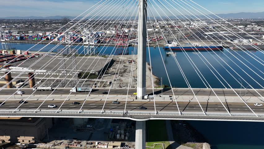 Long Beach, California, USA - Aerial View of International Gateway Bridge Next to Terminal Island, CA With Cargo Shipping Containers at the Los Angeles Port Next to San Pedro, CA
