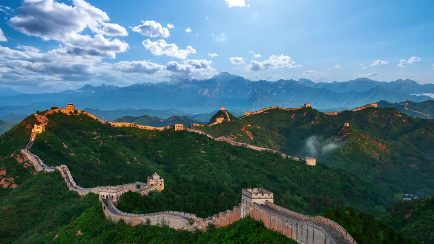 This video presents the magnificent Great Wall of China winding across China’s great rivers and mountains, showcasing the spectacular and grand beauty of this world-famous cultural heritage and national landmark. It captures the ancient great wall standing on green mountain peaks, blending the grandeur of ancient architecture with the stunning scenery of China’s vast and magnificent natural landscape, ideal for China tourism promotions and cultural heritage content.
