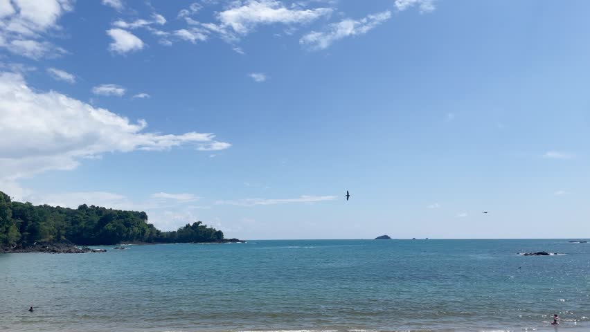 People on the beach in Costa Rica. Tourists on the Pacific coast of Costa Rica.