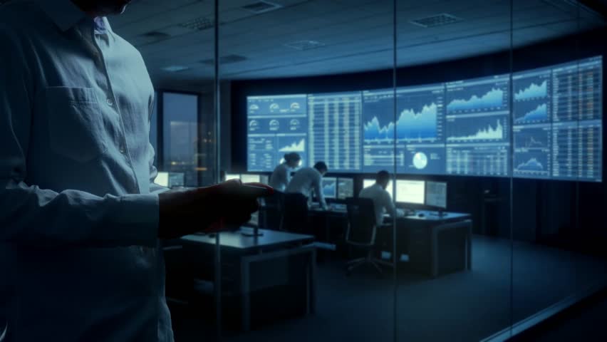 Team Of Security Analysts Carefully Examines Threat Intelligence And Incident Updates With Urgency