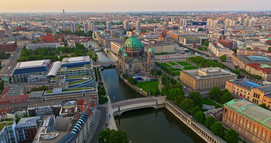 Aerial view of Famous Berlin cathedral at sunrise with famous television tower is in the background. Berlin, Germany