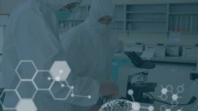 Animation of data processing and chemical formula over diverse scientists in lab. global science, data processing and digital interface concept digitally generated video. - Powered by Shutterstock - Get 15% off with code: PIKWIZARD15