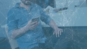 Animation of network of connections over businessman using tablet. Global business connections data processing digital interface and technology concept digitally generated video. - Powered by Shutterstock - Get 15% off with code: PIKWIZARD15