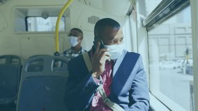 Animation of virus cells over african american man with face mask using smartphone. Global pandemic, patriotism and digital interface concept digitally generated video. - Powered by Shutterstock - Get 15% off with code: PIKWIZARD15
