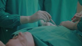 Animation of connections over hands of diverse surgeons during operation. Health, medicine, connections and technology concept digitally generated video. - Powered by Shutterstock - Get 15% off with code: PIKWIZARD15