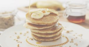 Syrup dripping onto pancake stack, digital bars rising with trend lines forming to visualize growth. Breakfast, cuisine, dessert, visualization, data, bar chart, infographic - Powered by Shutterstock - Get 15% off with code: PIKWIZARD15
