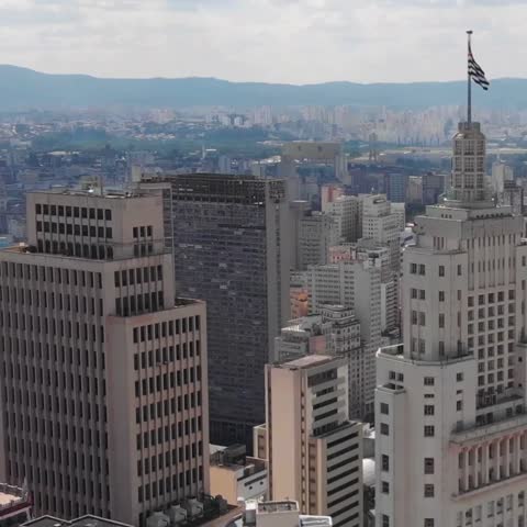 Happy birthday Sao Paulo with portugese text and top view of cityscape