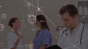 Animation of network of connections over diverse doctors working in hospital. Global medicine, healthcare, connections and digital interface concept digitally generated video. - Powered by Shutterstock - Get 15% off with code: PIKWIZARD15