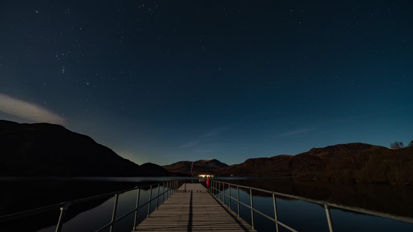 A time-lapse off the night sky over Aira Force Steamer Jetty on a Moonlit night