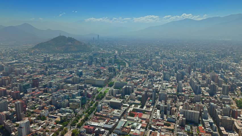 Aerial panoramic cityscape of Santiago de Chile, Andean cordillera mountain town