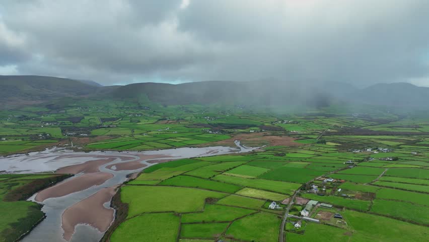 Epic aerial Ireland Landscapes rain shower over Kerry Mountains Dingle peninsula views