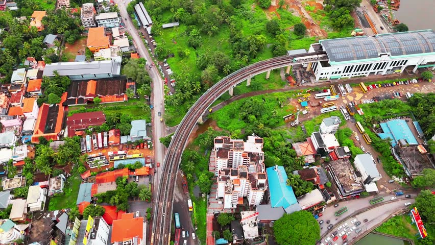 Bird’s-eye aerial drone view of Bandra Kurla Complex roads, flyover, Sea Link, and Western Express Highway in Mumbai, India. Dense traffic, modern infrastructure, and urban planning showcase the city’s fast-paced metropolitan life.