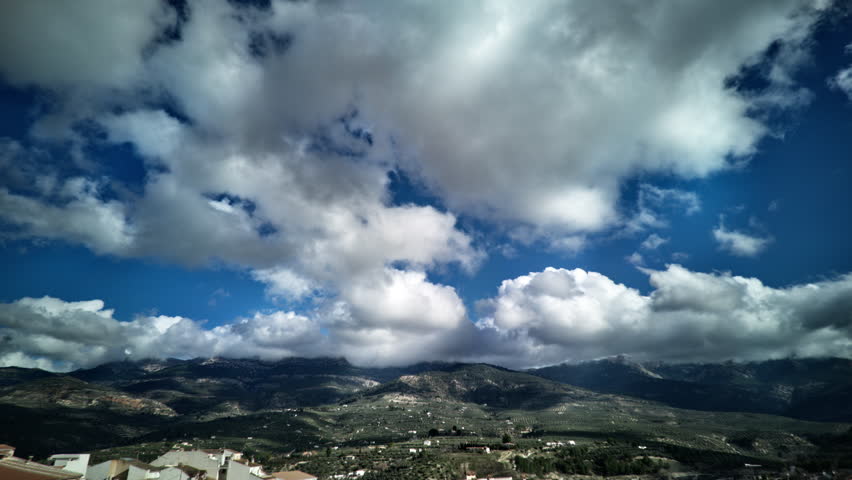  Clouds over the mountains Time-lapse 