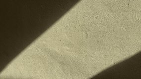 A clean, high-resolution shot of a neutral concrete surface featuring a dramatic diagonal shadow, perfect for minimalist graphic design and architectural background themes. - Powered by Shutterstock - Get 15% off with code: PIKWIZARD15
