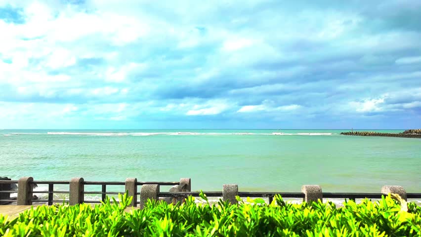 Coastal waves and clouds time lapse